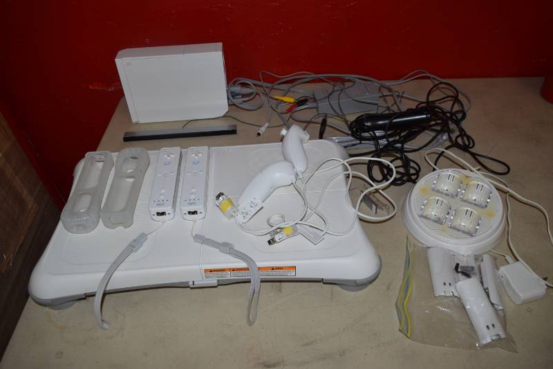 lot 38 image: Nintendo Wii and Fit Board