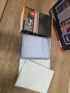lot 1002 image: 50 Pack Baseball Card Top LoadersSleeves - Retail $0