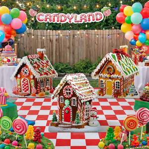 lot 1545 image: 3 Pcs 31-40 Gingerbread Village Cardboard Cutouts Stand Up Gingerbread House Backdrop Photo Props Standup Waterproof PVC for Xmas Party Floor Yard Outdoor Indoor Home Decor