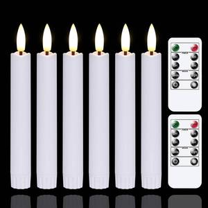 lot 15472 image: Battery Operated Flameless Taper Candles with Two Remote Timer, 6.4 LED 3D-Wick Window Candles, Flickering Long-Lasting Warm Light Electric Pack of 6 Flameless Candlesticks (0.78 Dia, White) - Retail $19