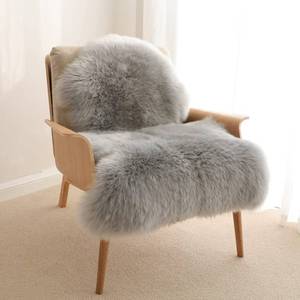 lot 15485 image: Gray Faux Sheepskin Chair Seat Covers, Fluffy Shag Fur Throw Rugs Room Decor 2x3 ft - Retail $19