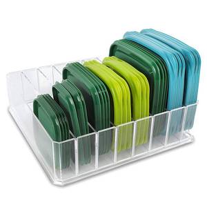 lot 15498 image: Lid Organizer for Food Storage Container, Plastic Lid Holder with 7 Adjustable Dividers for Kitchen Pantry Cabinet and Drawer, Countertop Cupboard Lid Organization, Medium, Clear - Retail $20