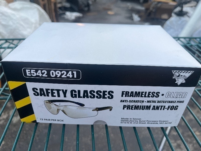 lot 95 image: SAFETY GLASSES 12 PAIR PER BOX WORKHORSE FRAMELESS  CLEAR ANTI-SCRATCH  METAL DETECTABLE PINS PREMIUM ANTI-FOG