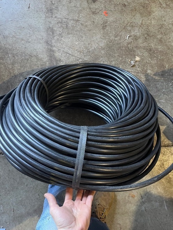 lot 209 image: � x 100 Huge Bundle of PVC Black Wire Casing