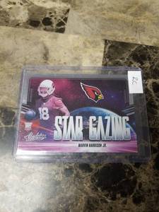 lot 906 image: 2024 Panini Absolute Football Star Gazing Marvin Harrrison Jr. Arizona Cardinals Rookie Card
