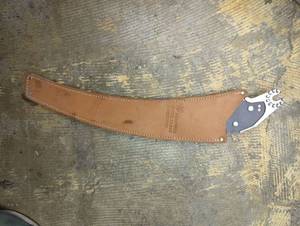 lot 16790 image: Hastings Saw with Leather Sheath, appears new, see images for condition.