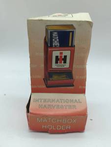 lot 16807 image: International Harvester IH Matchbox Holder, new in open box.