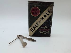 lot 16830 image: Half and Half Burley and Bright Tobacco Tin with Tool