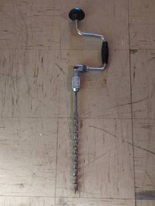 lot 16748 image: Manual Hand Drill with Spiral Auger Bit, used.