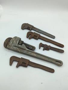 lot 16780 image: Ridgid Pipe Wrench Collection, used, 5 wrenches total.