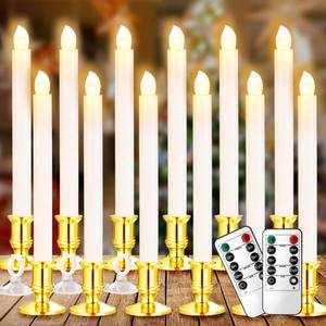 lot 1661 image: YAUNGEL Christmas Window Candles, 12 Pack Battery Operated Flameless Taper Candles for Windows with Timer Remote, Electric Candle Lights with Candle Holders Suction Cups for Christmas