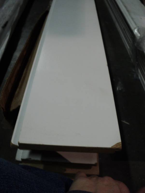 lot 3161 image: (8) ct. lot composite wood trim pieces, 5 x 8, white, damaged corners