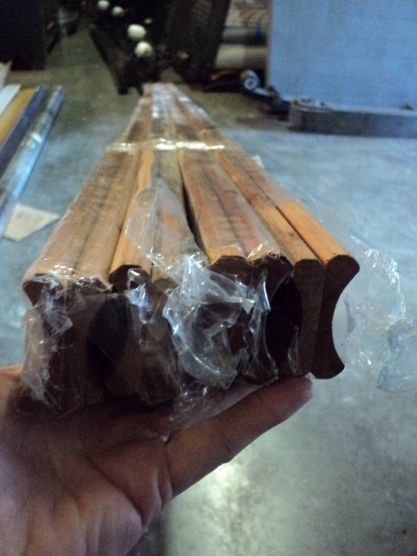 lot 3165 image: (4) packages Cedar Safe Closet Cove Moulding, 2 x 8