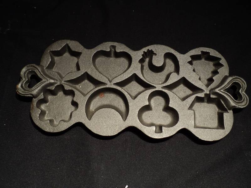 lot 3186 image: (1) cast iron muffin pan,  shapes