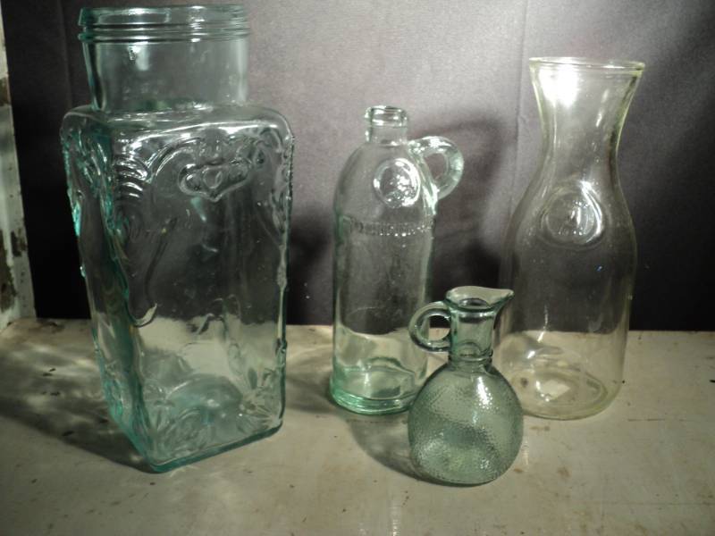 lot 3238 image: (4) ct. mixed lot decorative glass bottles, caraffe and vase