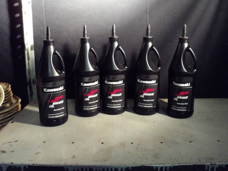 lot 3295 image: (5) 32 oz.  bottles Kawasaki Gear and wet brake oil