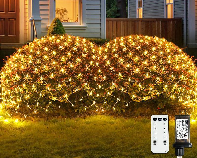 lot 6243 image: JMEXSUSS Outdoor Net Lights Waterproof, 12ft x 5ft Plug in with 8 Modes Remoter, 360 LED Net Lights for for Bush Patio Christmas Tree Decor (Clear Wire, Warm White)