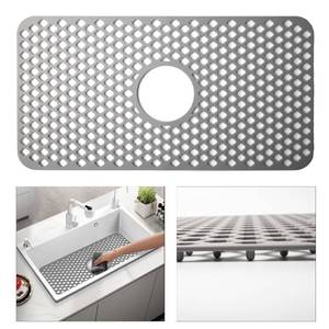 lot 2417 image: TwinnekYR Silicone Sink Mat, 24.6x 12.9 Kitchen Sink Protector Grid for Bottom of Center Drain Sink, Gray Non-slip Heat Resistant Liner for Farmhouse Stainless Steel Porcelain Sink