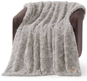 lot 3143 image: UGG Adalee Faux Fur Throw Blanket Luxury Lightweight Cozy Soft Throw for Couch Bed or Chair Hypoallergenic Machine Washable Double-Sided Fluffy Blanket Home Decor, 50-inch x 70-inch, Seal Grey