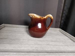 lot 2735 image: Brown and Cream USA Pottery Pitcher