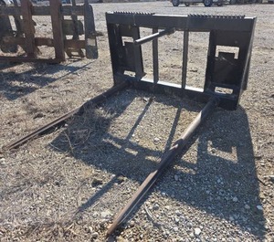 lot 24 image: John Deere Bale Spear Attachment for Skid Steer