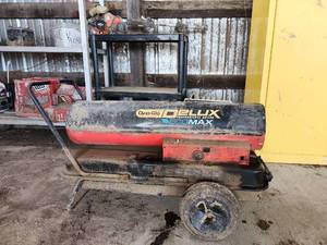 lot 14392 image: Assorted Lot W Dyna-Glo Delux Professional Ecomax Heater, Storage Rack, and More