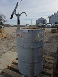 lot 14485 image: Industrial Peppermint Oil Storage Drum with Pump