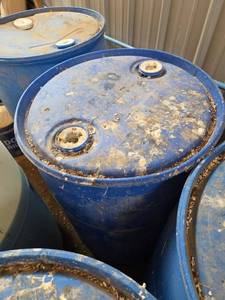 lot 14493 image: 55-Gallon Blue Industrial Chemical Drum  Unknown Contents
