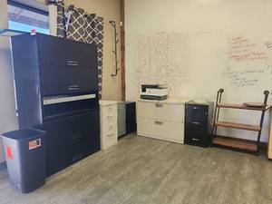 lot 15129 image: Assorted Lot W Metal Filing Cabinet Collection, Industrial Pipe Shelving Unit, and HP Office Jet 9012e Printer