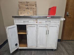 lot 15134 image: Distressed White Rolling Cabinet with Stainless Steel Top