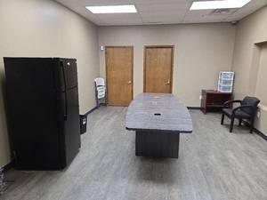 lot 15135 image: Contents of Room Including GE Refrigerator, Conference Table and More