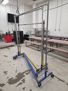 lot 15181 image: Industrial Rolling Clothing Racks - Set of 3
