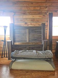 lot 20434 image: Ashley Furniture Queen Size Headboard, Cow Hide Rug, and Mattress Topper