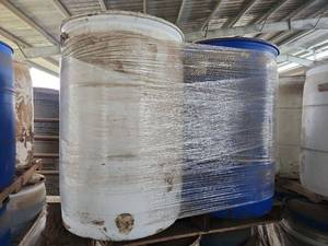 lot 16092 image: Pallet of Industrial Storage Drums with Hazard Labels - VOLUME UNKNOWN