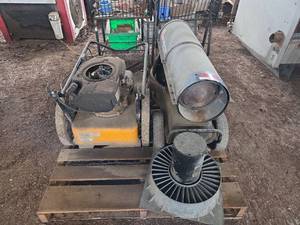 lot 16120 image: Cub Cadet ST 400 22in Wheeled String Trimmer and Mr Heater 140,000 BTU