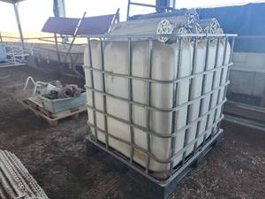 lot 16604 image: Industrial IBC Tote with Conveyer Parts