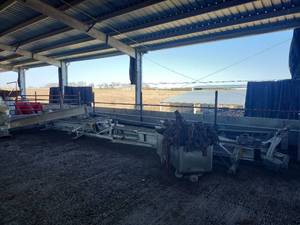 lot 16615 image: Assorted Lot of Industrial Grain Conveyor System Components Including Metal Framework, Rollers, and More
