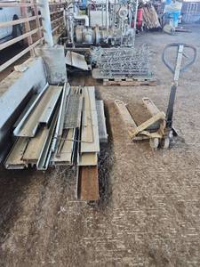 lot 16618 image: Industrial Manual Pallet Jack w Hooks and Metal