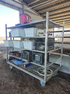 lot 16635 image: Industrial Storage Rack with Equipment Including Storage Bins, Milk Crates, and More