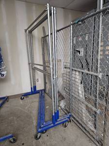 lot 15819 image: Industrial Clothing Racks - Set of 3