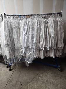 lot 15821 image: Commercial Clothing Rack W Bulk Lot of Lab Coats