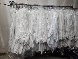 lot 15822 image: Commercial Clothing Rack W Bulk Lot of Lab Coats
