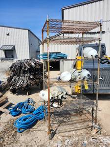 lot 15925 image: Commercial 6-Tier Chrome Wire Shelving Unit w Hoses and Contents