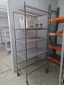 lot 23512 image: Commercial Wire Shelving Unit with Wheels