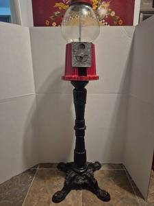 lot 28297 image: 1940s Ford Gumball Machine with Cast Iron Stand