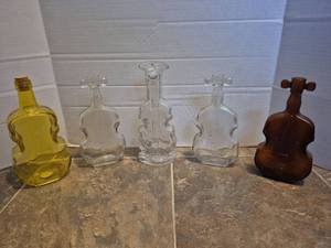 lot 28500 image: Decorative Violin Shaped Glass Bottles Collection