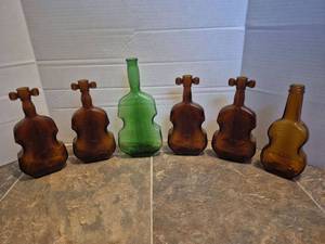 lot 28501 image: Violin Shaped Glass Bottles Collection