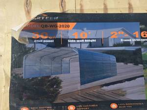lot 3225 image: Steel Carport with Enclosed Sidewalls - 20x20 ft