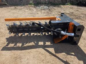 lot 3698 image: Wolverine Skid Steer Trencher TCR-12-48H