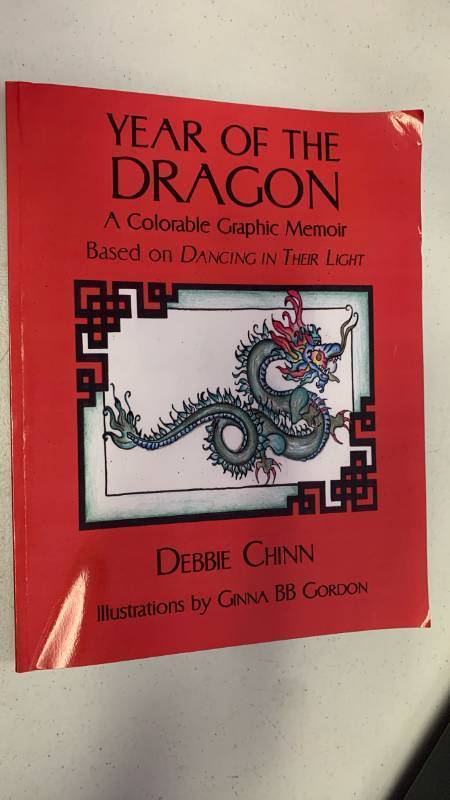 lot 394 image: Year of the Dragon A Colorable Graphic Memoir by Debbie Chinn Book DP60